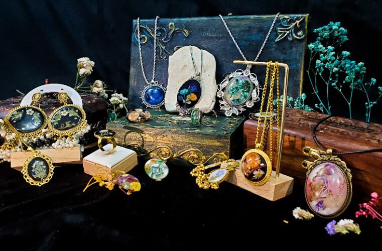 Gullrung real flower jewelry colors collection in red, black, green, blue and multi-floral resin on hand-carved wooden boxes