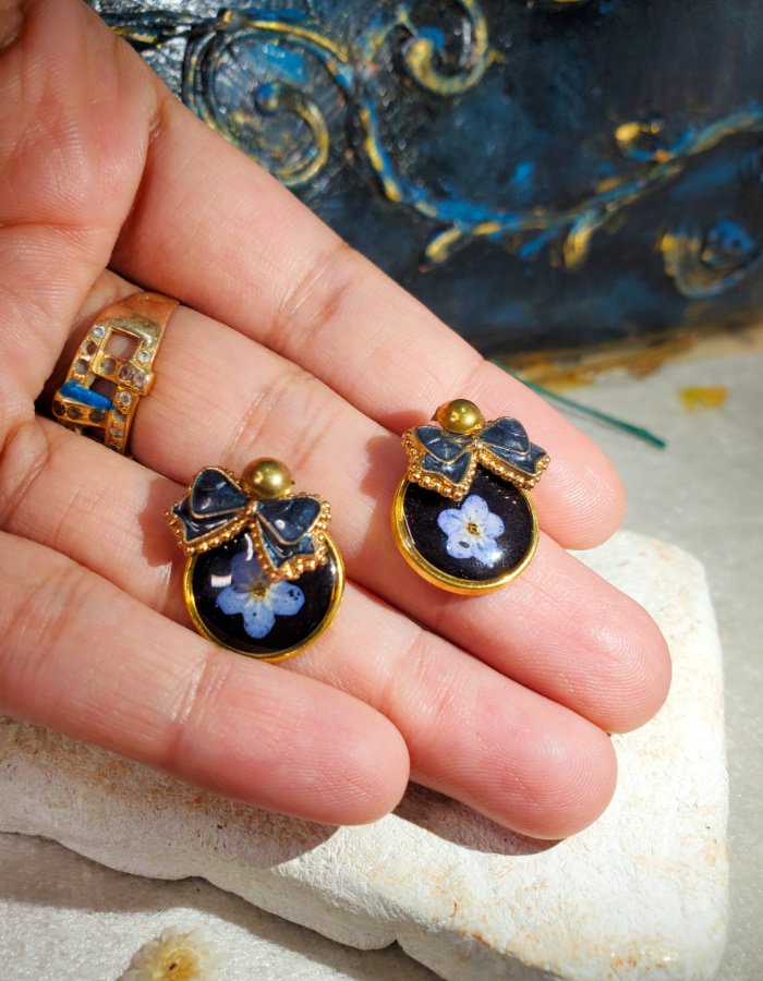 Bazm-e-Shab Black Floral Earrings – handmade forget me not earrings, worn in hand