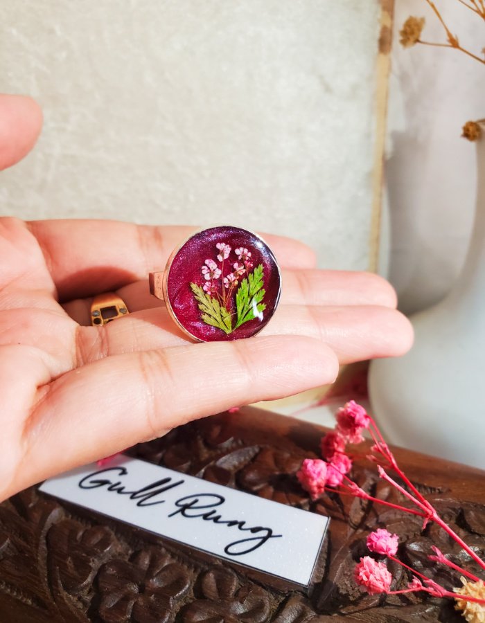 Durr-e-Shafaq Gulabi Red Floral Ring – handmade real flower ring, worn in hand